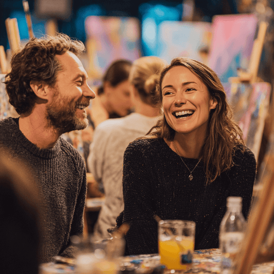 2 people talking and laughing at a Paint and Sip Party