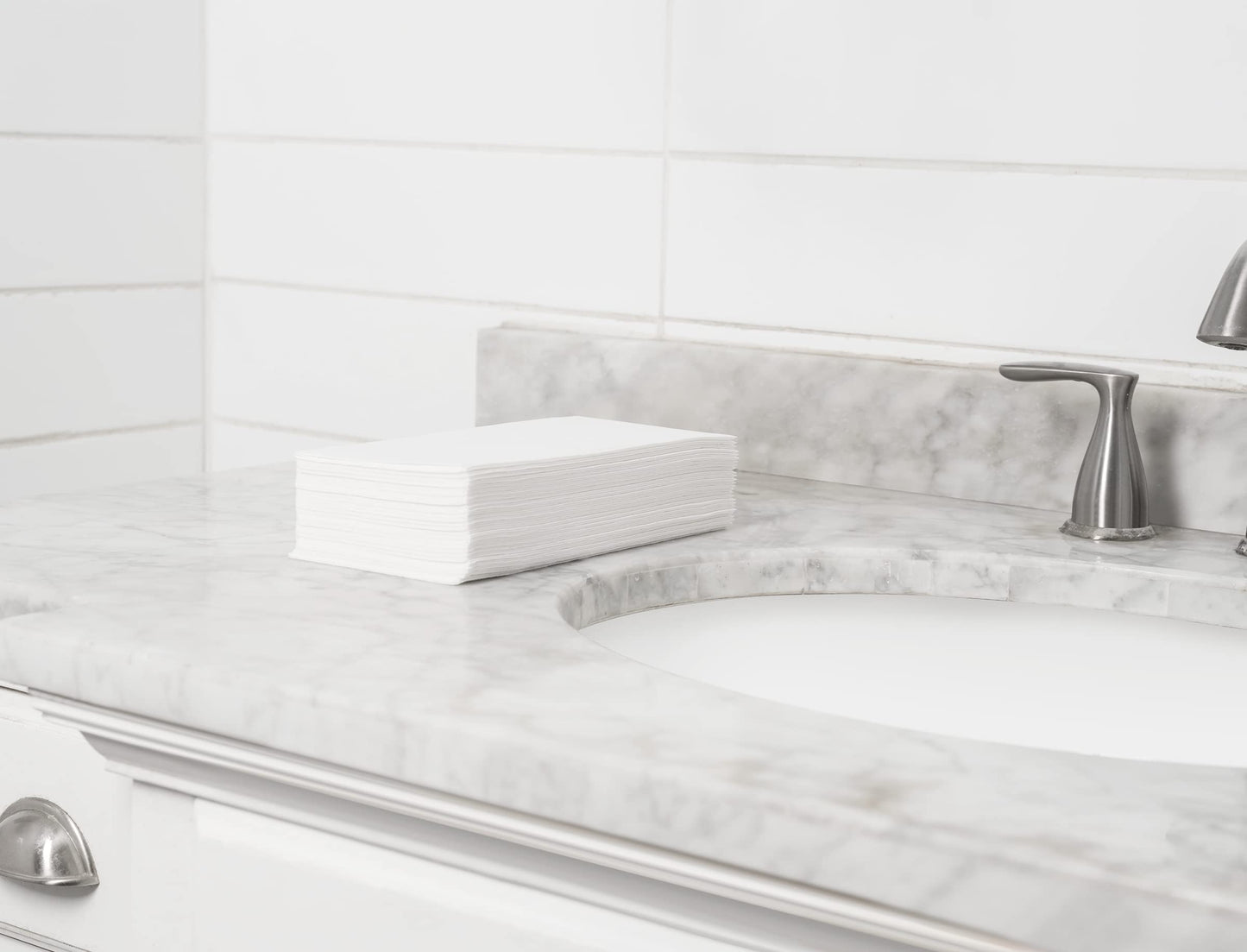 NP-PPGT-WHT-75, Cloth-like guest towels on sink counter for hand drying