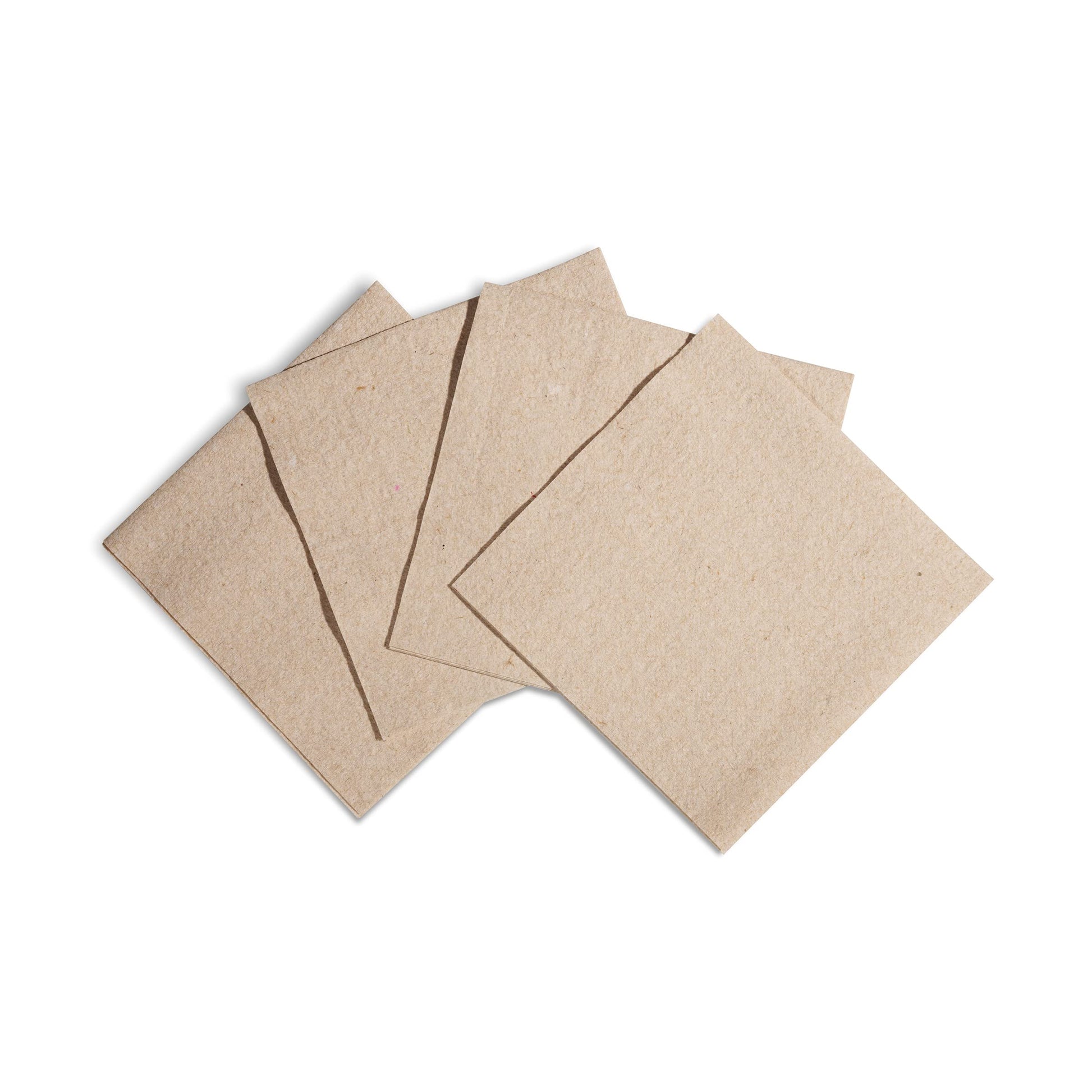 Flat lay of Naperee natural disposable napkins set against white background