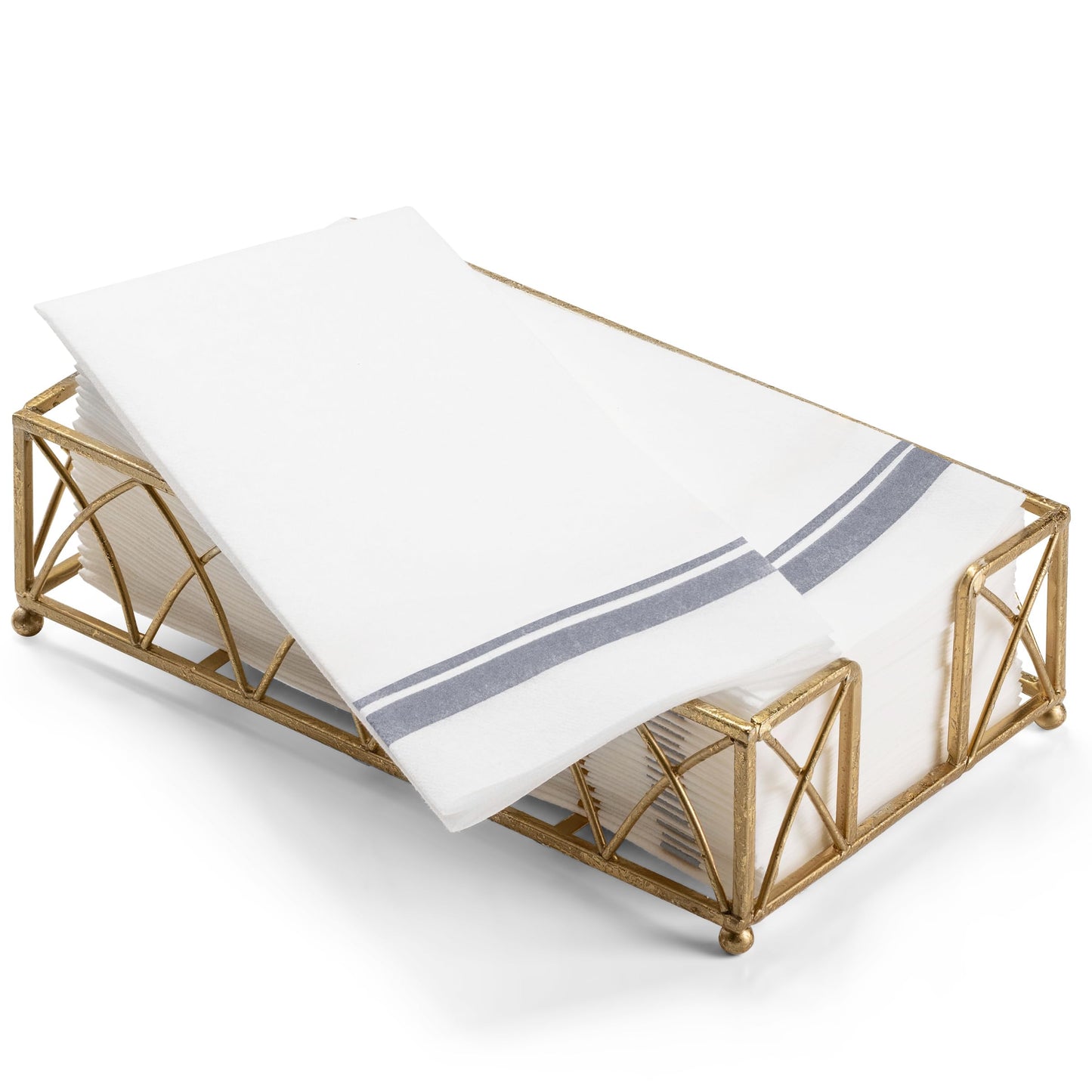 Disposable guest napkins with silver trim neatly stacked in napkin holder