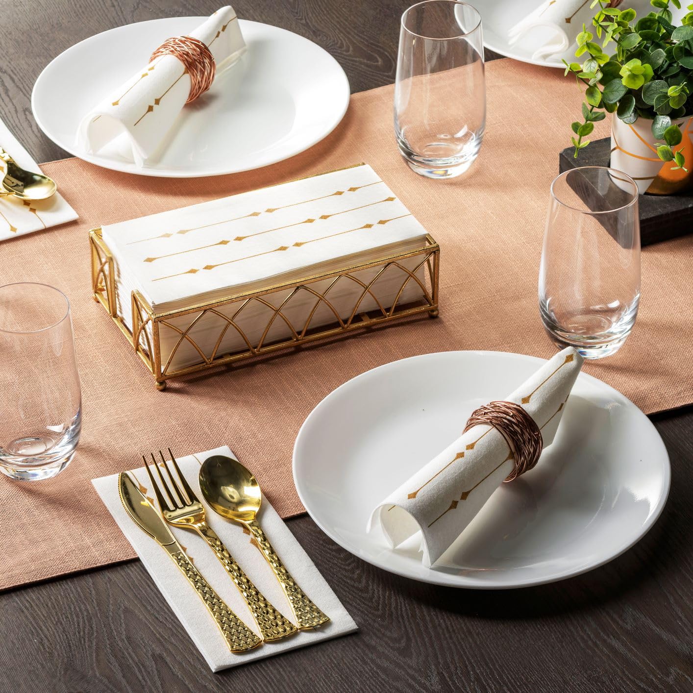 Decorative airlaid paper towel with gold diamond design on formal display