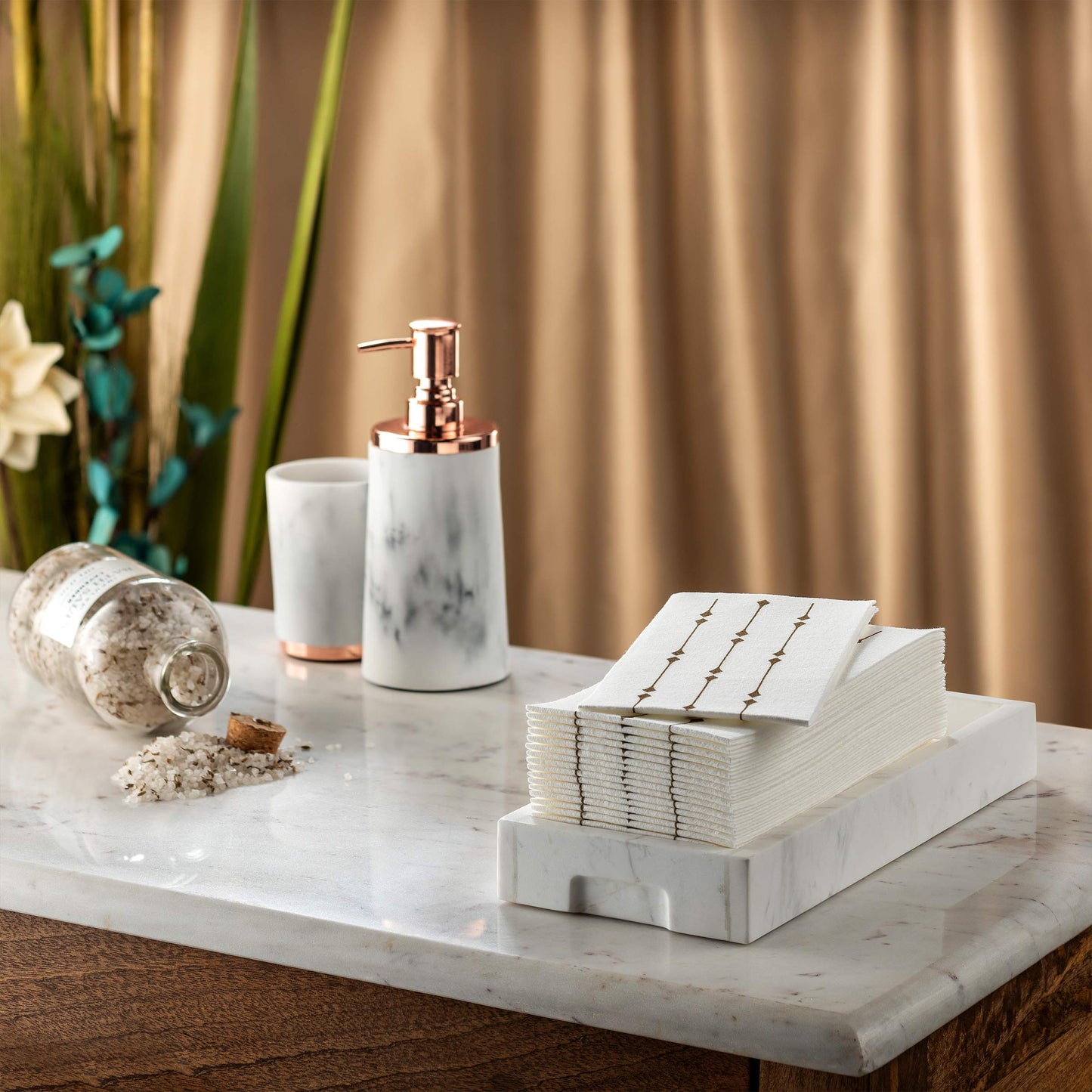 Decorative airlaid paper towel with gold diamond design near bathroom sink