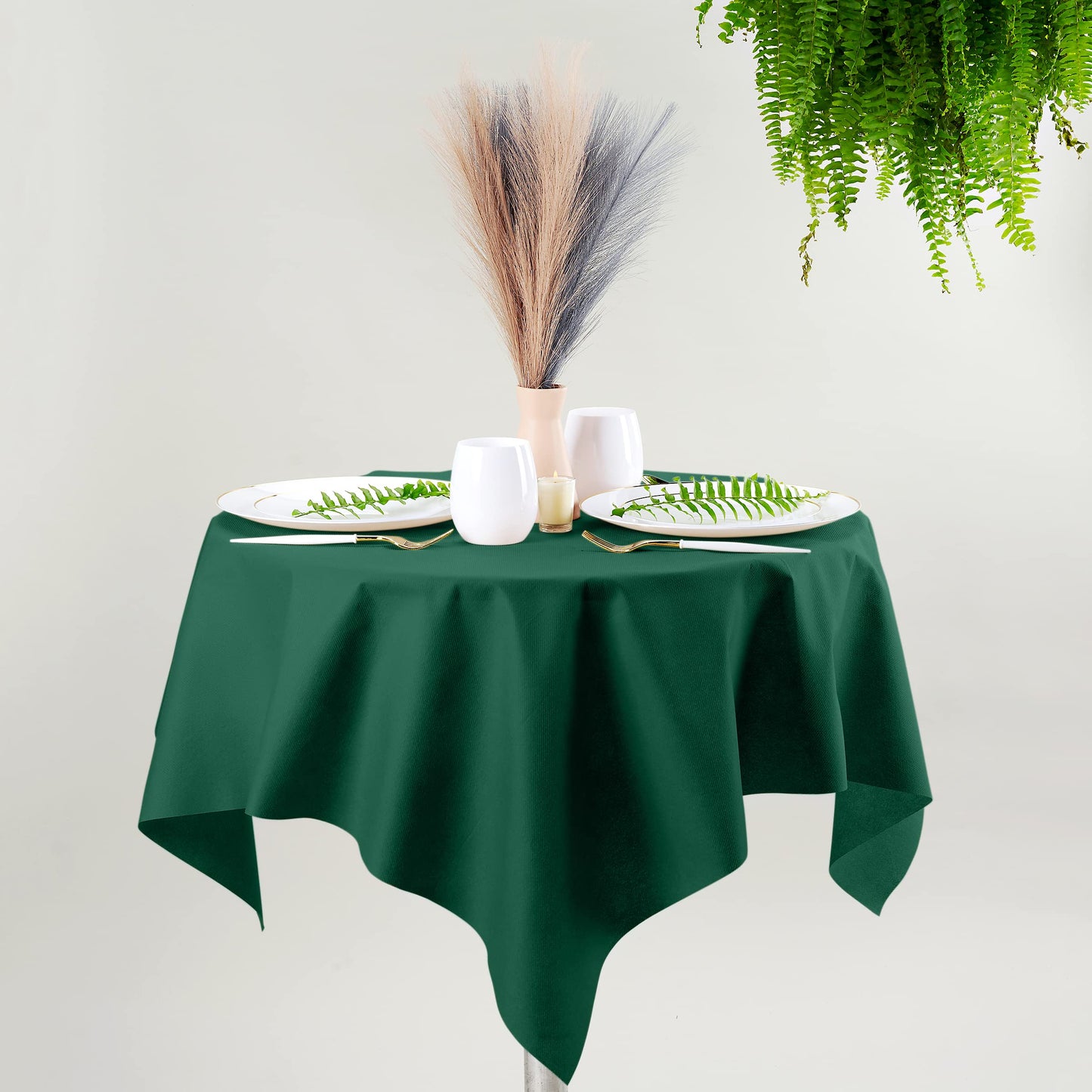 SV-TCFQ40-GREN/25, SV-TCFQ48-GREN/20, SV-TCFQ55-GREN/20, Servietto green disposable linen-like table cloth on formal table with silver cutlery and floral arrangements