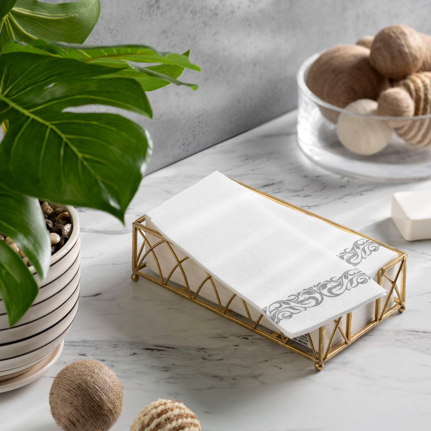Napkin tray with BloominGoods silver floral guest towels on table