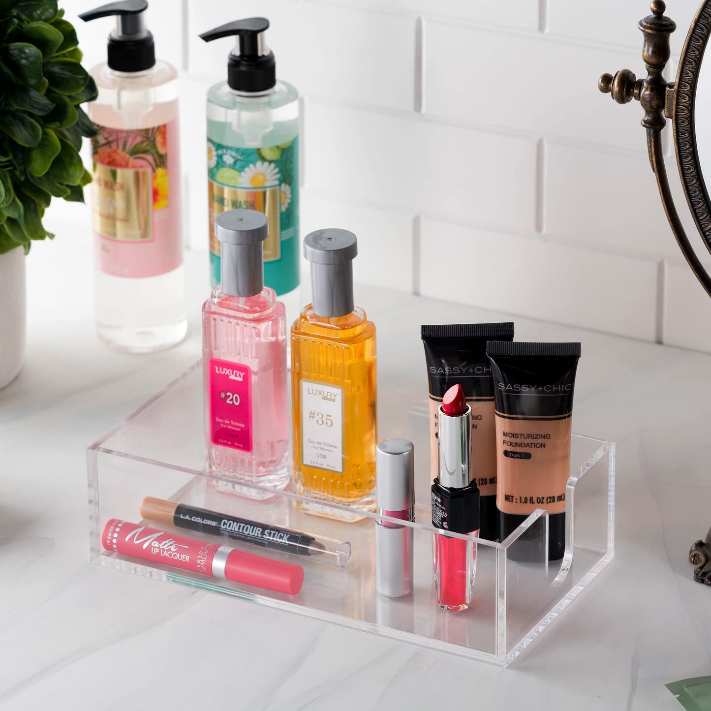 BG-NH-ACR/GT, Top view of BloominGoods clear guest towel tray styled with cosmetics