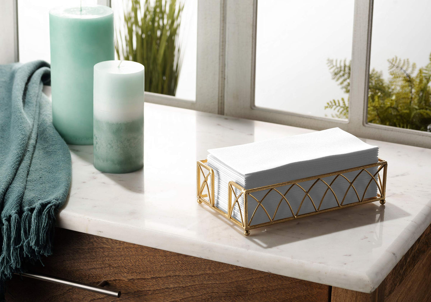 Linen-like airlaid guest towel by Servietto folded on bathroom counter
