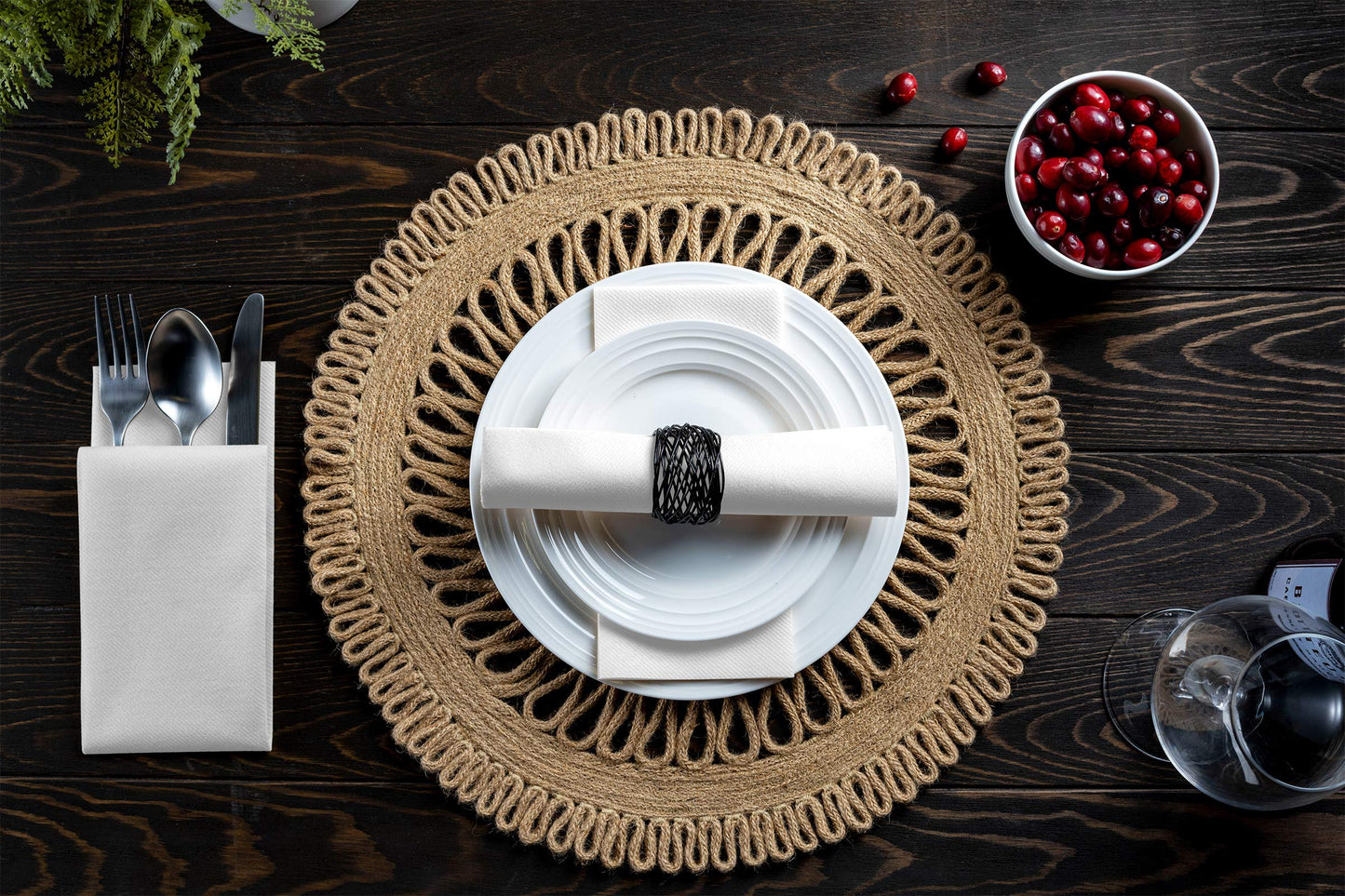 Servietto white guest towel showing soft linen-feel texture on top of plate under place setting