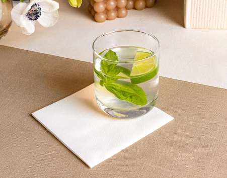 White linen-feel cocktail napkins by Servietto for drink service