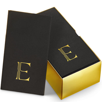 BG-TOLM-GT-BGS-E/50, BloominGoods guest towel with gold stamped letter E on black linen-feel napkin